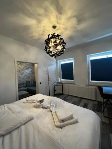 Postel nebo postele na pokoji v ubytování MILANO Messe Business Ferienwohnung Düsseldorf + 39 fotografií