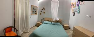Postel nebo postele na pokoji v ubytování Casacocco' - Agri Host