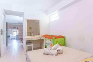 A bed or beds in a room at PALIAMA BY THE RIVER
