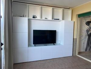TV a/nebo společenská místnost v ubytování Suite 514