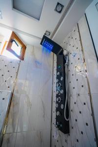 a shower in a bathroom with a shower at AR Luxury VIP Apartments Ravda in Ravda