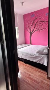 Postel nebo postele na pokoji v ubytování Mi casa es tu casa