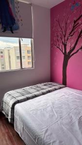 Postel nebo postele na pokoji v ubytování Mi casa es tu casa