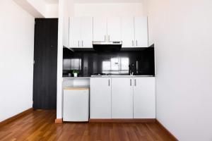 Kuchyň nebo kuchyňský kout v ubytování Hotel Z3 Pereira