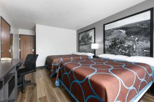 Letto o letti in una camera di Super 8 by Wyndham Grapevine/DFW Airport Northwest