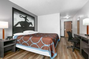 Letto o letti in una camera di Super 8 by Wyndham Grapevine/DFW Airport Northwest