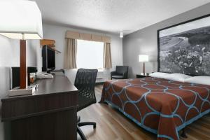 Letto o letti in una camera di Super 8 by Wyndham Grapevine/DFW Airport Northwest