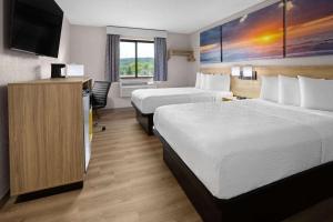 Postel nebo postele na pokoji v ubytování Days Inn by Wyndham Hornell NY
