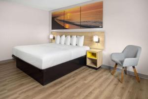 Postel nebo postele na pokoji v ubytování Days Inn by Wyndham Hornell NY