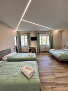Krevet ili kreveti u jedinici u okviru objekta Raffaelli Suite