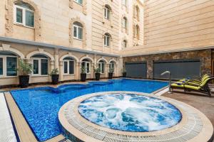 Πισίνα στο ή κοντά στο Grand Regency Doha, Trademark Collection by Wyndham