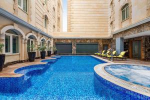 Πισίνα στο ή κοντά στο Grand Regency Doha, Trademark Collection by Wyndham