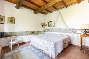 a bedroom with a bed and a window at Apartment the Fireplace a relax oasis near Florence in Villore