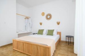 Postel nebo postele na pokoji v ubytování BLISS Corfu