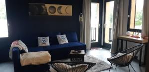 Posezení v ubytování Le 6 du Pitalugue Bonascre appartement en duplex 55m2