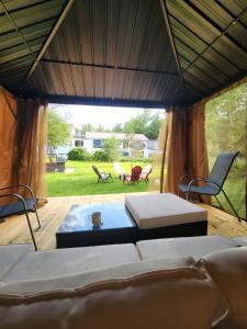 a room with two beds and a swimming pool at Backyard Bliss in the White Mountains in Lincoln