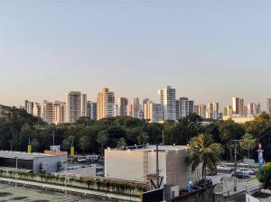 a city with tall buildings and a parking lot at Flat 203 Ed Clarice Lispector, Ilhotas- Rio Poty in Teresina