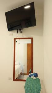 Postel nebo postele na pokoji v ubytování Orizaba Suites