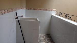 Koupelna v ubytování Orizaba Suites