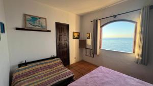 Ένα ή περισσότερα κρεβάτια σε δωμάτιο στο Casa da Costa +83 φωτογραφίες