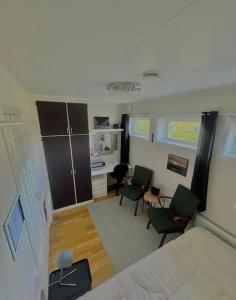 En TV eller et underholdningssystem på Apartment with parking and sauna