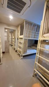 Postel nebo postele na pokoji v ubytování Malee Hotel