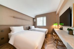 Photo de la galerie de l'établissement True Go Hotel Shanghai Xujiahui, à Shanghai