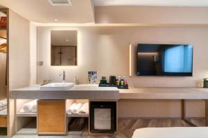 Photo de la galerie de l'établissement True Go Hotel Shanghai Xujiahui, à Shanghai