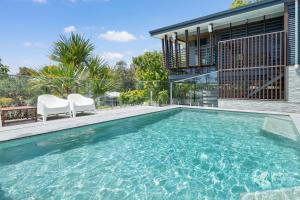 Swimmingpoolen hos eller tæt på Bombora 4 Bedroom By Discover Stradbroke