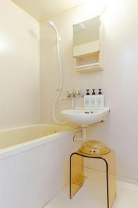 Koupelna v ubytování 立石5丁目m201 + 35 fotografií