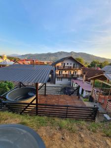 an overhead view of a building with a roof at PENSIUNEA NASUI in Vişeu de Sus