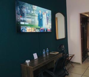 TV a/nebo společenská místnost v ubytování Hotel El Campanario