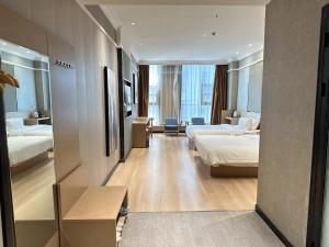 Φωτογραφία από το άλμπουμ του 海菲酒店 郑州高铁东站CbD国际会展中心店 σε Τσεντσόου +73 φωτογραφίες