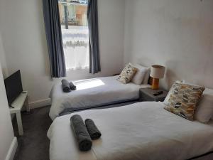 Katil atau katil-katil dalam bilik di Cosy Apartment Central Bath