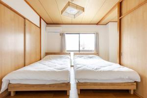 En eller flere senge i et værelse på 立石5丁目m402