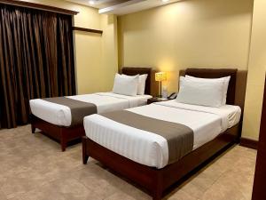 Postel nebo postele na pokoji v ubytování Hotel Del Rio
