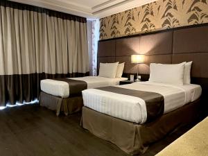 Postel nebo postele na pokoji v ubytování Hotel Del Rio