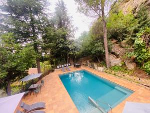 The swimming pool at or close to Aptos El Manantial Burunchel