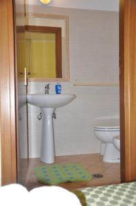 Koupelna v ubytování Albergo Casa Lupi
