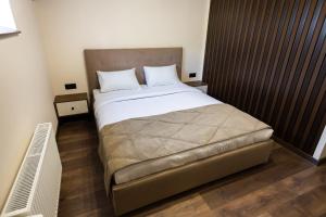 Postel nebo postele na pokoji v ubytování Prime Hotel