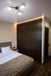 Postel nebo postele na pokoji v ubytování Prime Hotel