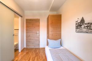 Postel nebo postele na pokoji v ubytování Hotel Alpensonne