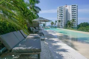 Kolam renang di atau dekat dengan New Beachfront Paradise at Armandos Le Club