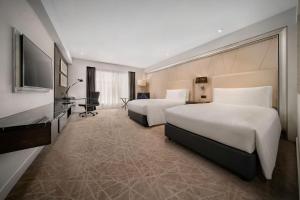 Postel nebo postele na pokoji v ubytování InterContinental Kuala Lumpur by IHG