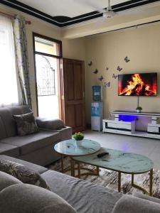 Area soggiorno di Greyline One Br with an Extra bed Bamburi