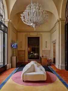 Postel nebo postele na pokoji v ubytování Palazzo Talìa - Small Luxury Hotels of the World