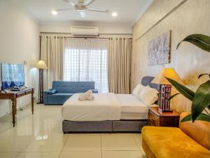 Katil atau katil-katil dalam bilik di Regency Tanjung Tuan Beach PD by Idealhub