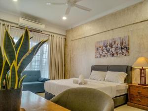 Katil atau katil-katil dalam bilik di Regency Tanjung Tuan Beach PD by Idealhub