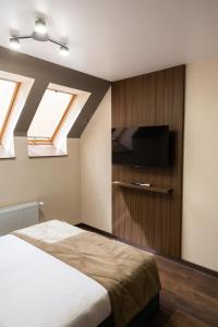 Postel nebo postele na pokoji v ubytování Prime Hotel