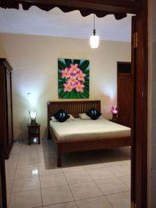 Postel nebo postele na pokoji v ubytování Kaia Lovina Guest House